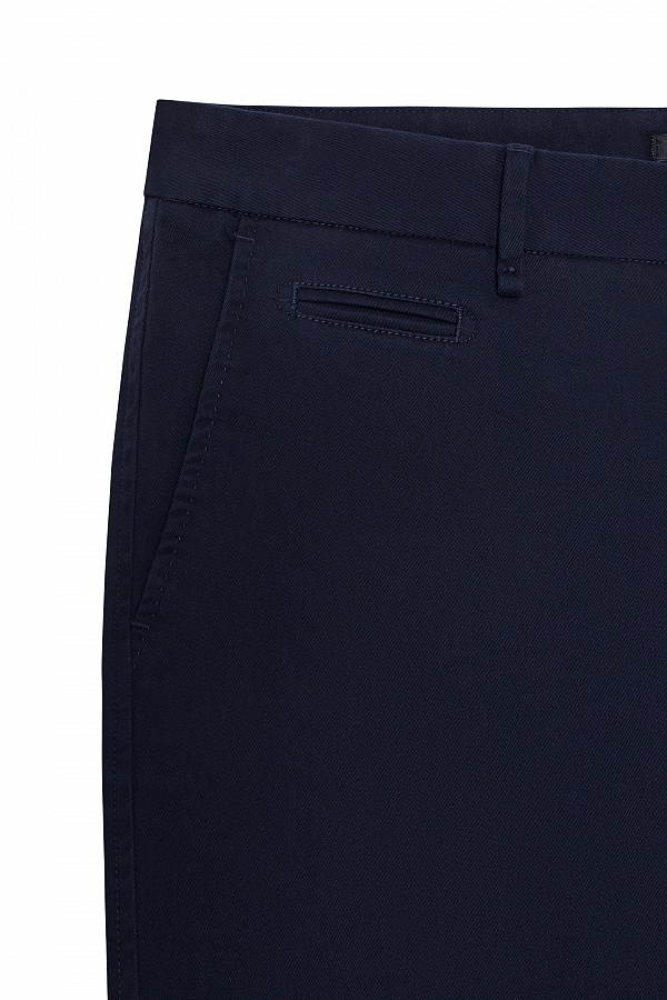 Темно-синие зауженные брюки